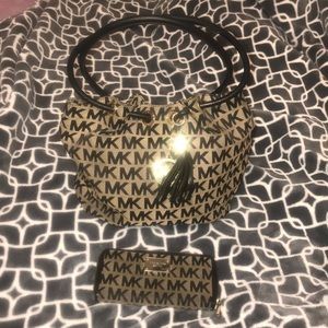 Authentic Michael Kors purse with matching wallet